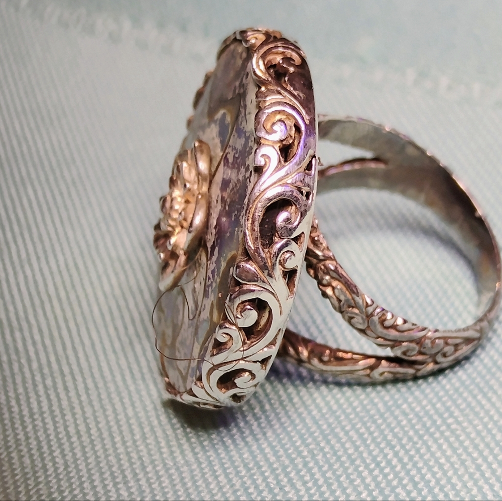 THE PURE BEAUTY OF NATURE IS RELEVANT WITHIN THESE ABALONE STERLING RINGS. 6 & 7